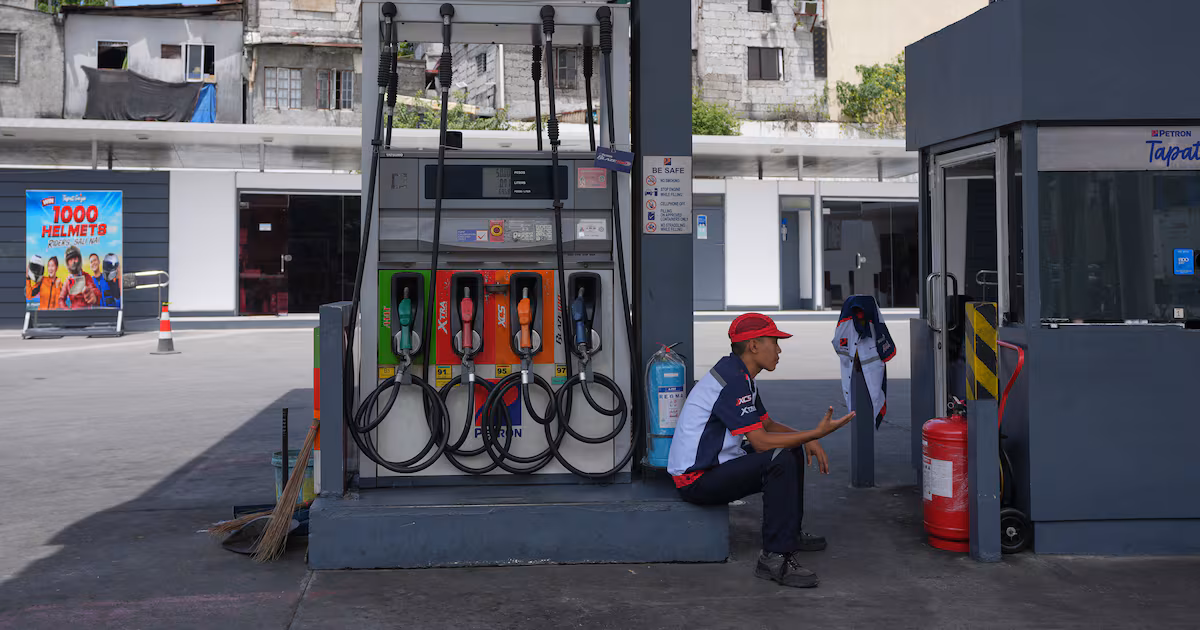 Wall Street erases a big loss and closes higher as oil prices fall